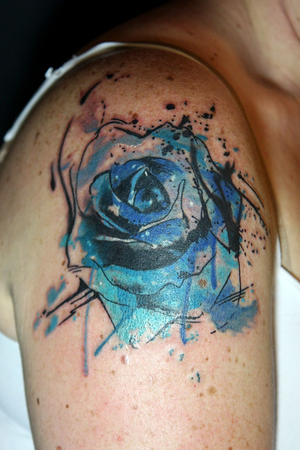 abstract watercolor blue rose tattoo