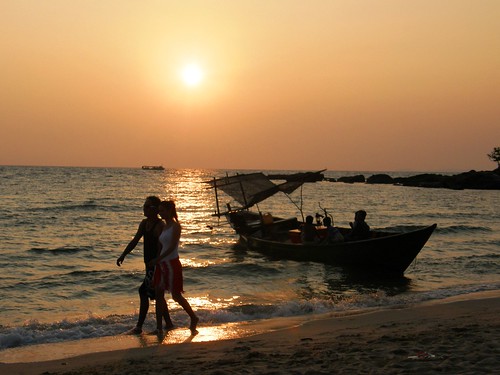 sunset sea woman beach boat cambodia sihanoukville southeastasia waves romance