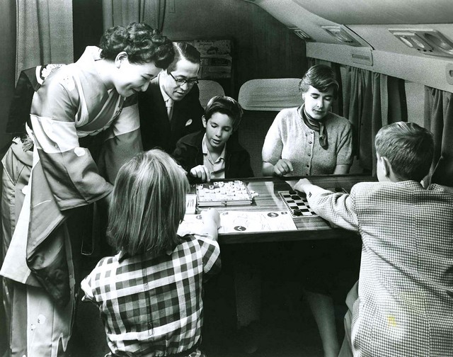 JAPAN AIR LINES -- Wow ! A First Class Family Game Room High Above the Pacific