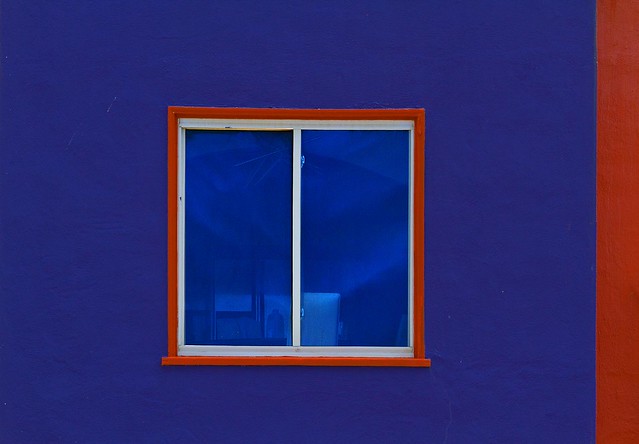 Along The Great Highway: window with blue and red