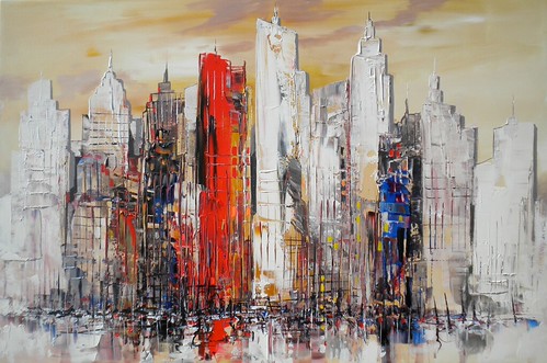 Pale skyline with tall red and white buildings