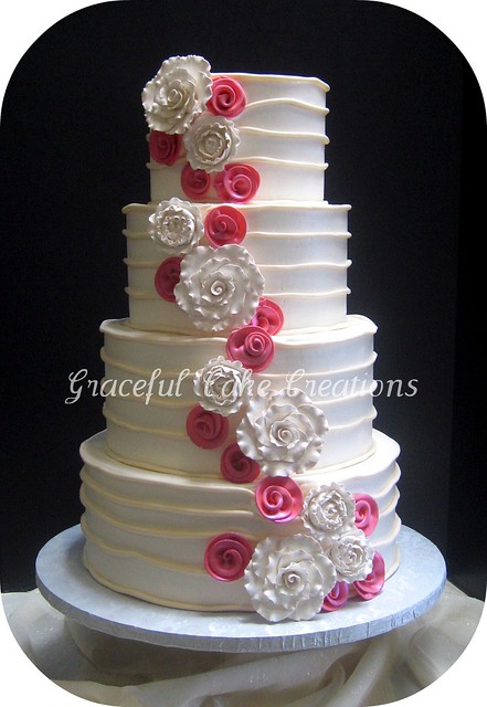 Elegant Ivory and Coral Pink Wedding Cake
