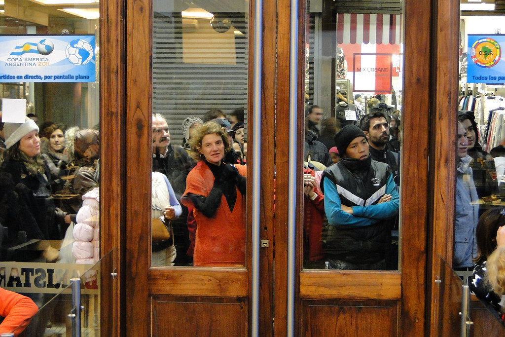 Crowd Watches Brazil-Paraguay Football Match through Restaurant Window - Calle Florida - Buenos Aires - Argentina