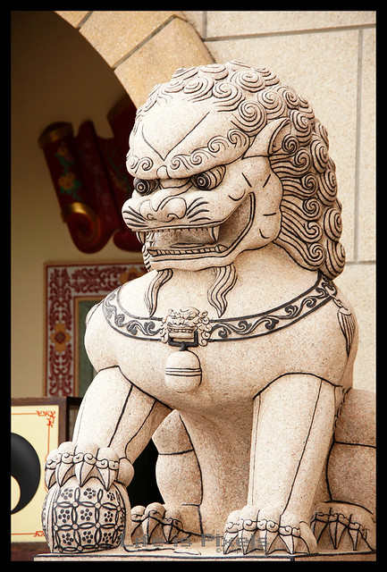 A Stone Lion Protecting the Gate