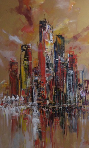 Dark golden tower above red reflections