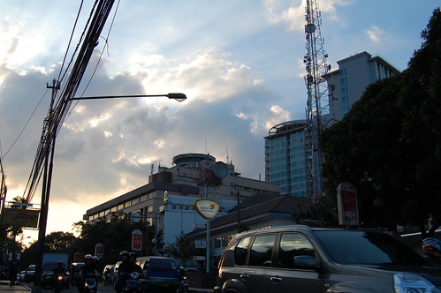 We're Back Home by Ikhlasul Amal, street sunset sky wired streetscape