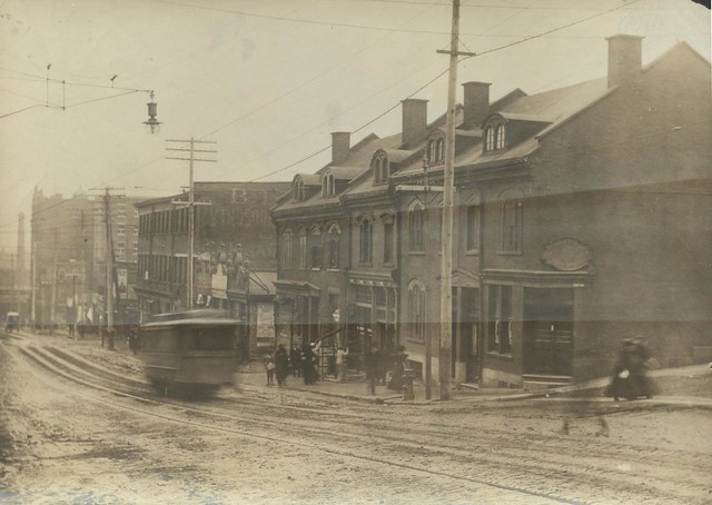 [Montreal street scene showing blurry tram]