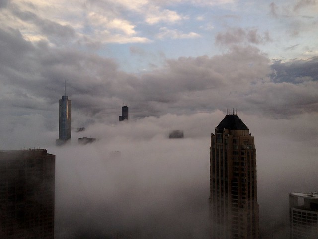 fog (dark below (street level)) and bright blue (above) sky - Chicago