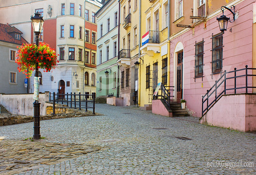 road street old city travel vacation urban brown house holiday building brick art history tourism window beauty stone wall architecture corner vintage town ancient colorful europe european exterior view sightseeing poland polish landmark center spot tourist medieval historic retro colourful past eastern renaissance tenement outing lublin