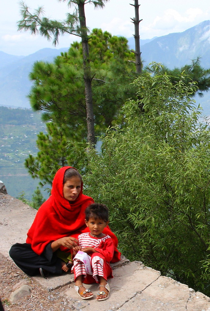 Mother & child tired from walking, near Danna village, Kashmir