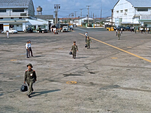 Tan Son Nhut Airbase in Saigon, Vietnam – 1973. approaching C-130 for boarding. Destination was Gia Lam Airport