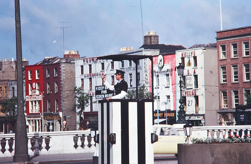Garda directing traffic, O'Connell Bridge, Dublin