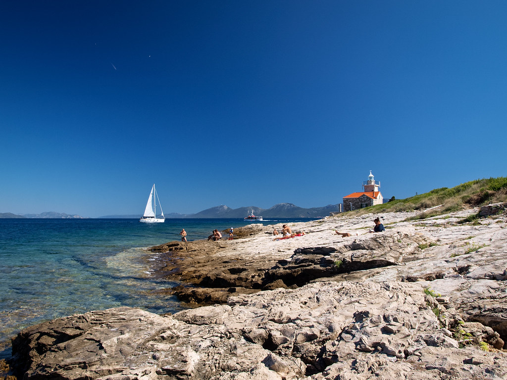 "Summer, Sea, beach, Boat - thats Croatia" by Macskafaraok is licensed under CC BY-ND 2.0. 