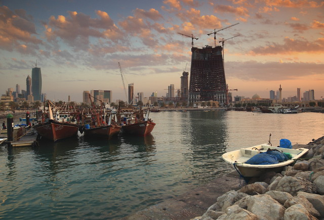 Kuwait - Fishing boats at sunset
