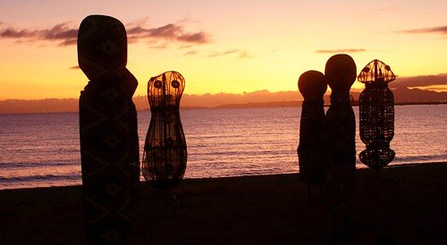 art beach strand sunrise dawn traditional silhouettes exhibition queensland mystical aboriginal figures townsville murri strandephemera girringunartists baguwithjiman
