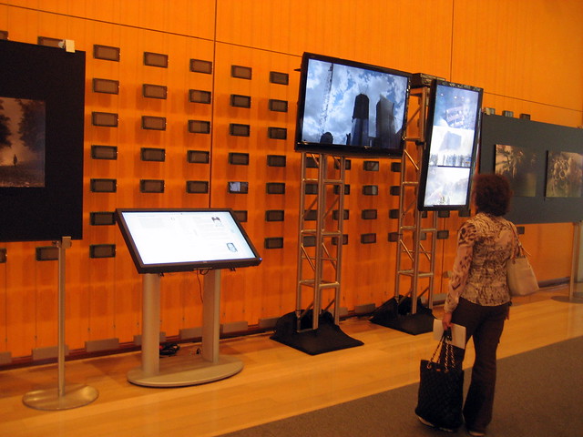 Video screens and an interactive exhibit