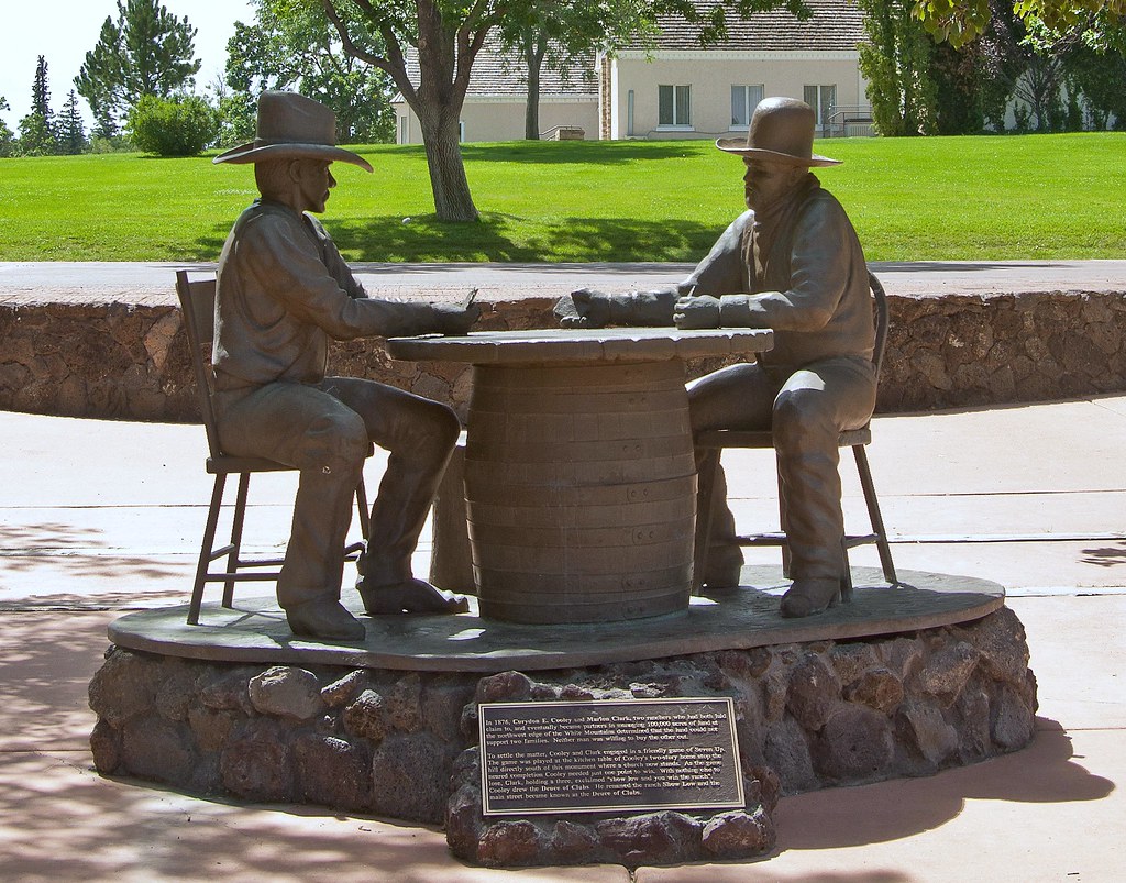 Cooley and Clark card game statue. Photo by TJfrom AZ; (CC BY-NC-ND 2.0)