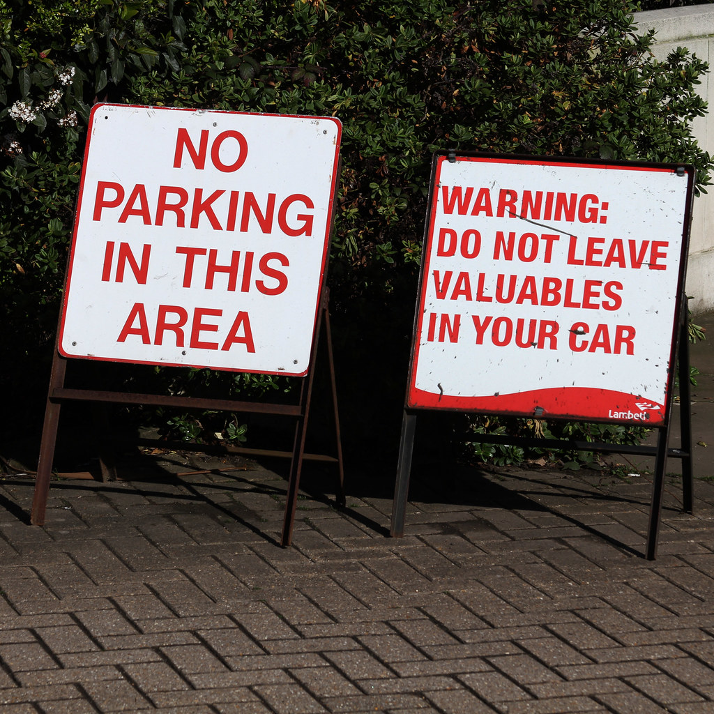 NO PARKING IN THIS AREA - WARNING: DO NOT LEAVE VALUABLES IN YOUR CAR