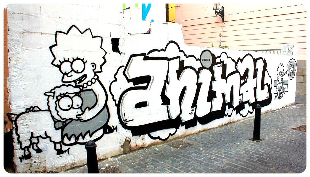 valencia street art lisa simpson save animals