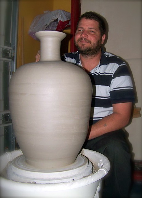 Jason Outlaw wheel-throwing large pottery vase