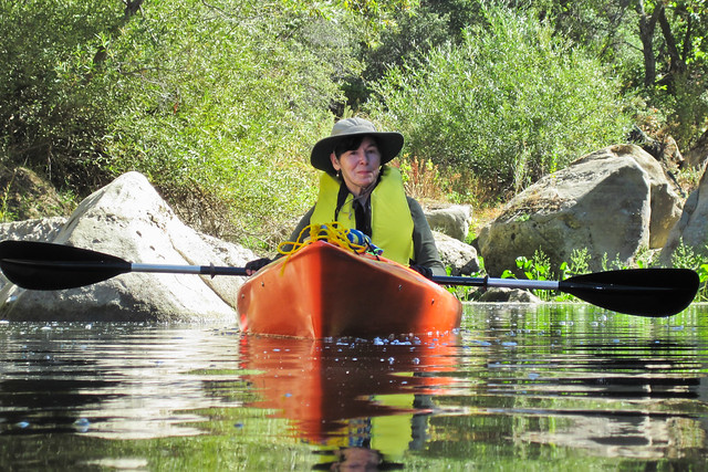 Jovette Mann in her sit-inside kayak in a shady cove - photo for her brother. ALL RIGHTS RESERVED EFFECTIVE 11/03/2011 AS THIS IS A GETTY IMAGES PHOTO