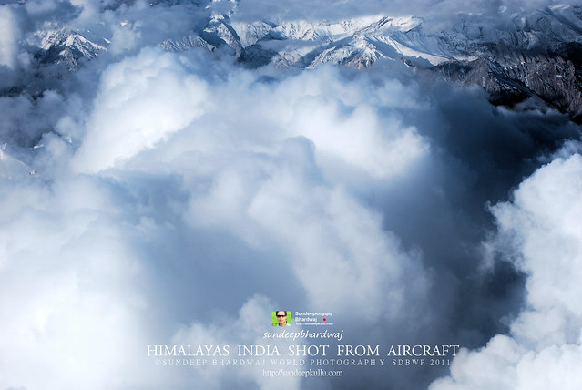 CLOUDS PHOTOSTORIES SHOT FROM AIRCRAFT LEH LADDAKH HIMALAYAS INDIA HMACHAL CULTURAL VILLAGE AWJL