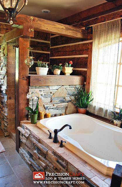 The Master Bath in this Log & Timber Hybrid Home
