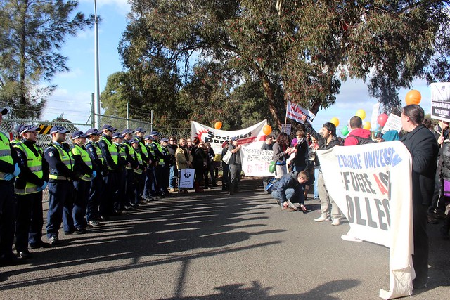 Police and protesters face off at the gates - Refugee Rights Protest at Broadmeadows, Melbourne