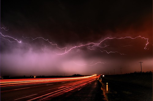longexposure storm night highway traffic timeexposure powerline lightning thunder rainynight crowsnesthighway lethbridgealberta