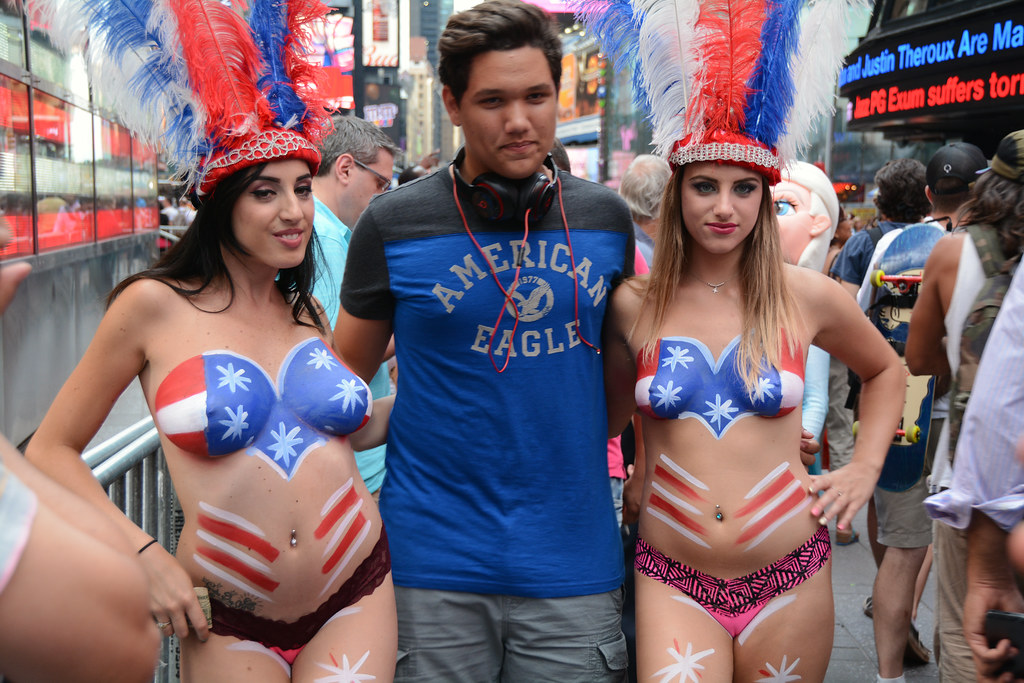 Women In Times Square In NYC Wearing Only Body Paint. 