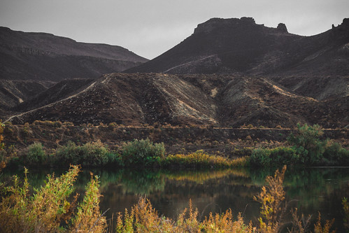 Snake River by Joshuaww, The calm surface of the Snake River passing by Celebration park. It looks tame, but according to all