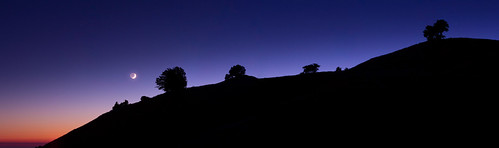 Moon setting over the ridge by Simon Christen - iseemooi