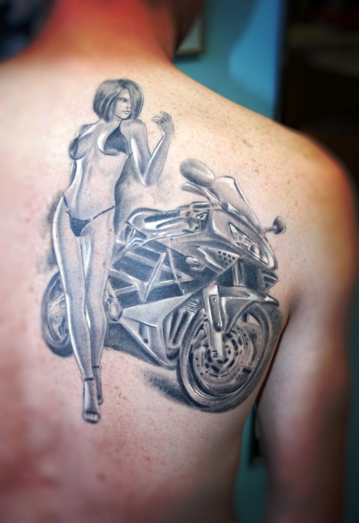 Lady with sport bike tattoo.