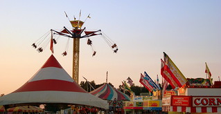 Skerbeck Brothers Shows Carnival Midway At Dusk.
