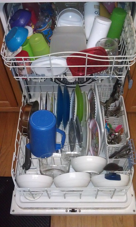 Adan loads dishwasher
