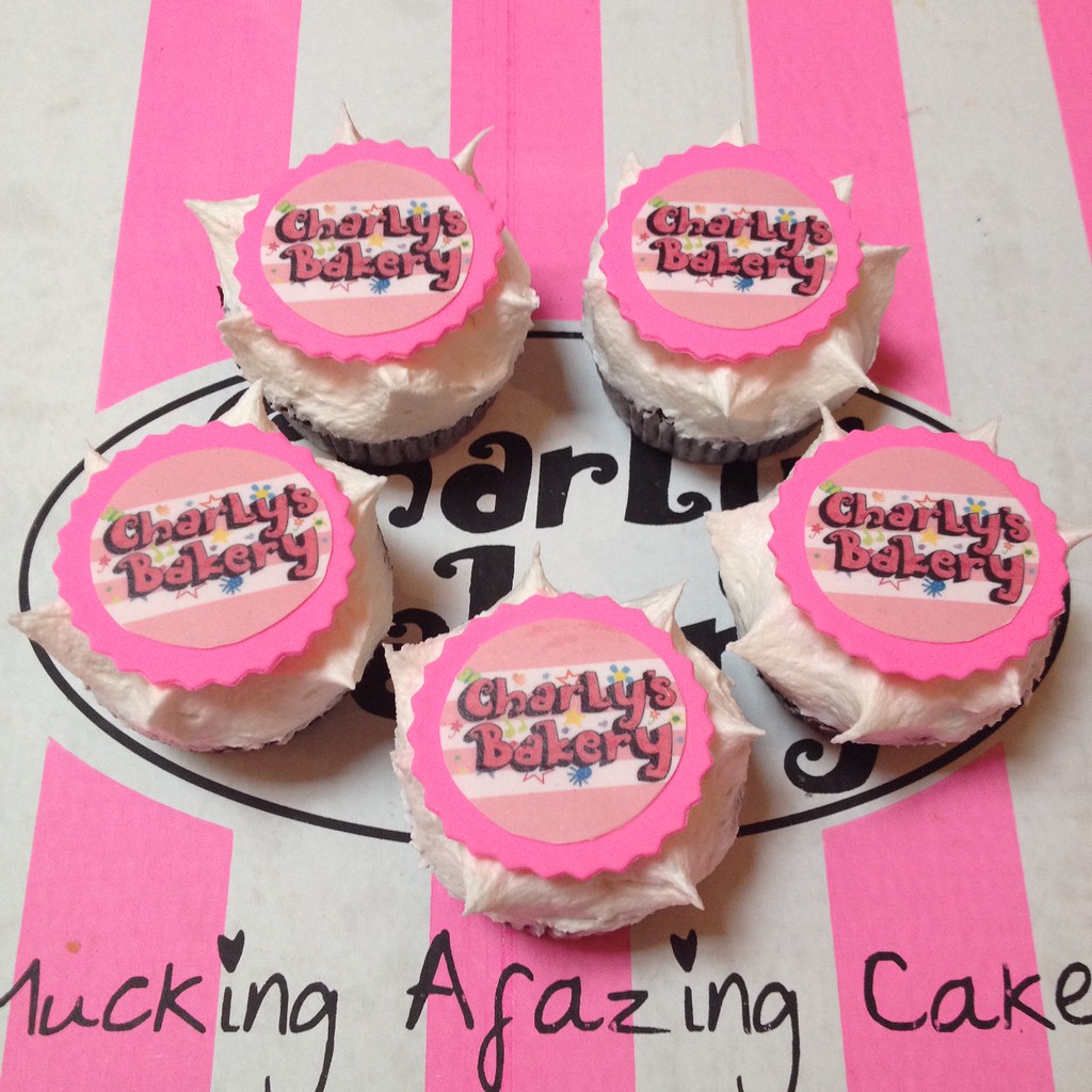 Wicked Chocolate cupcakes iced with luf luf icing decorated with edible Charly's Bakery logo prints on round discs