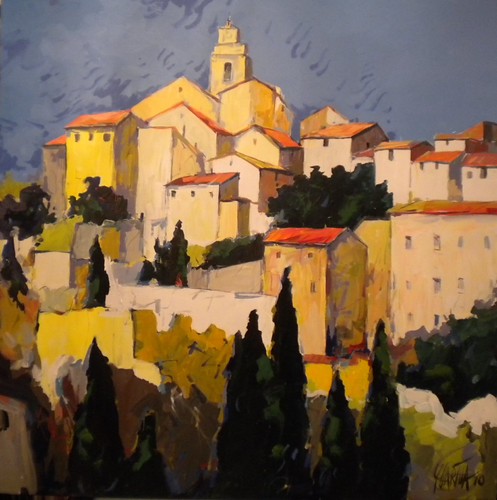 Golden hilltop buildings with dark cypress trees