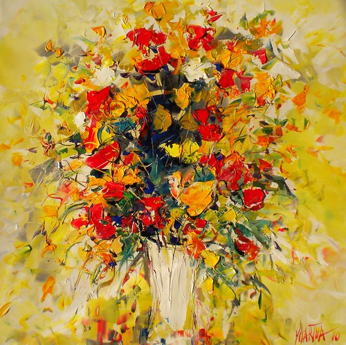 Red and orange bouquet on bright yellow