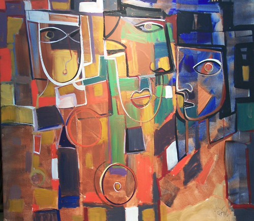 Fragmented faces with orange and yellow geometric forms