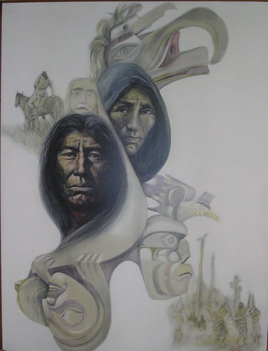 Two faces among pale carved bird forms