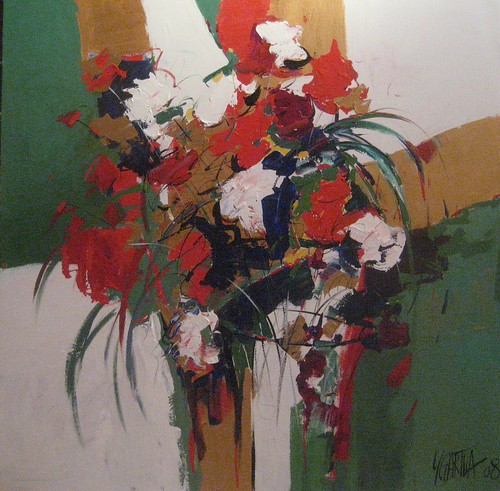 Red and white flowers with dark green leaves