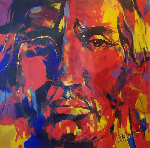 Close-up face in vivid red, yellow and blue