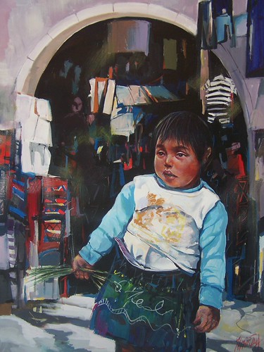 Child standing among containers in a doorway