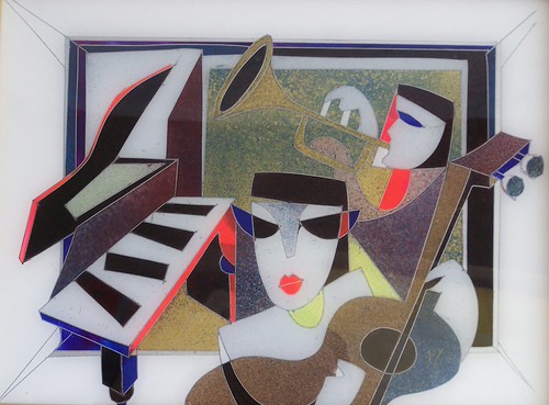 Two angular musicians with a keyboard and guitar