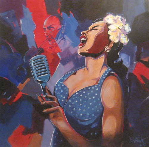 Singer in a blue dress with a flower in her hair