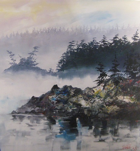 Misty islands and shoreline rocks