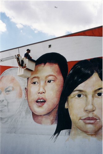 Detail of children's faces on an exterior mural