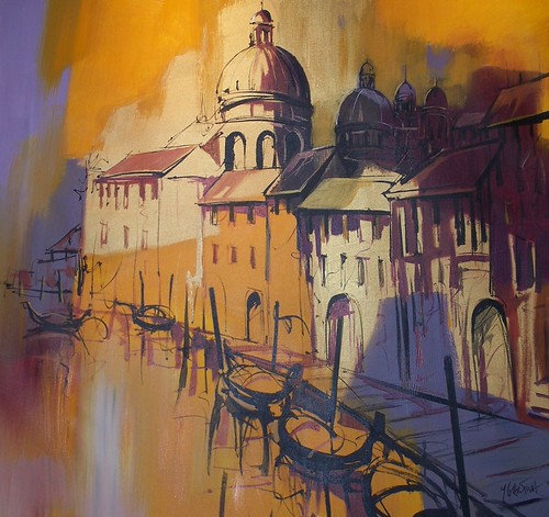 Domed church beside a canal in warm light