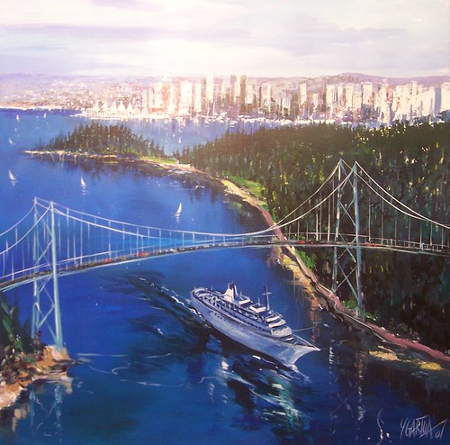 Suspension bridge spanning a blue harbour