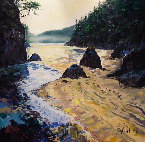 Rocky inlet enclosed by wooded shores